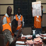 Elections officials counting votes
