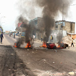 Protesters burn tires in Kinshasa
