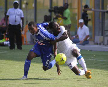 TP Mazembe's Deo Kanda play against Berekum Chelsea in the Champions League