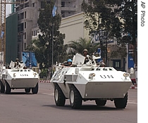 UN troops in armored vehicles drive through the streets of Kinshasa, Congo, Monday, August 21, 2006